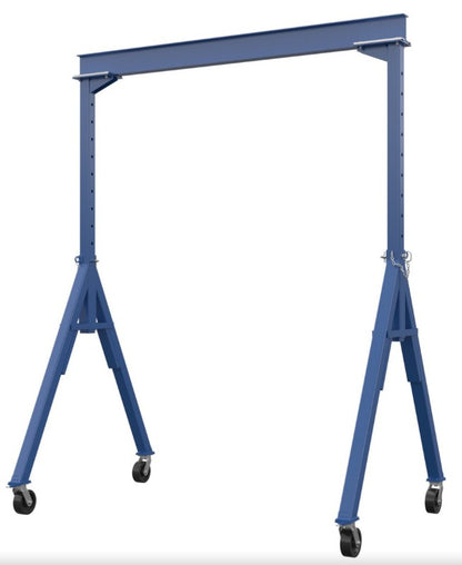 Portable adjustable steel gantry crane by Vestil with heavy-duty I-beam for lifting and moving heavy loads.