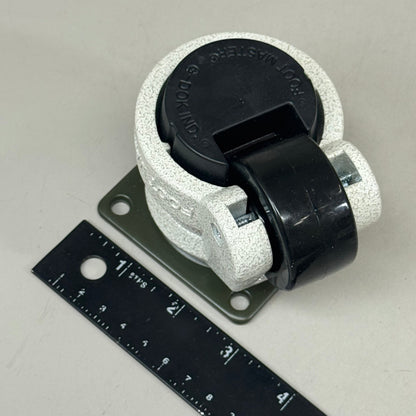 Set of four FOOT MASTER swivel caster wheels with green wheels and mounting plates, suitable for marble or similar surfaces.
