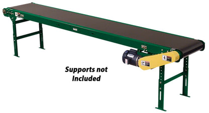 Industrial powered slider bed belt conveyor by TACT Industrial Products, showing the end drive section and conveyor belt.