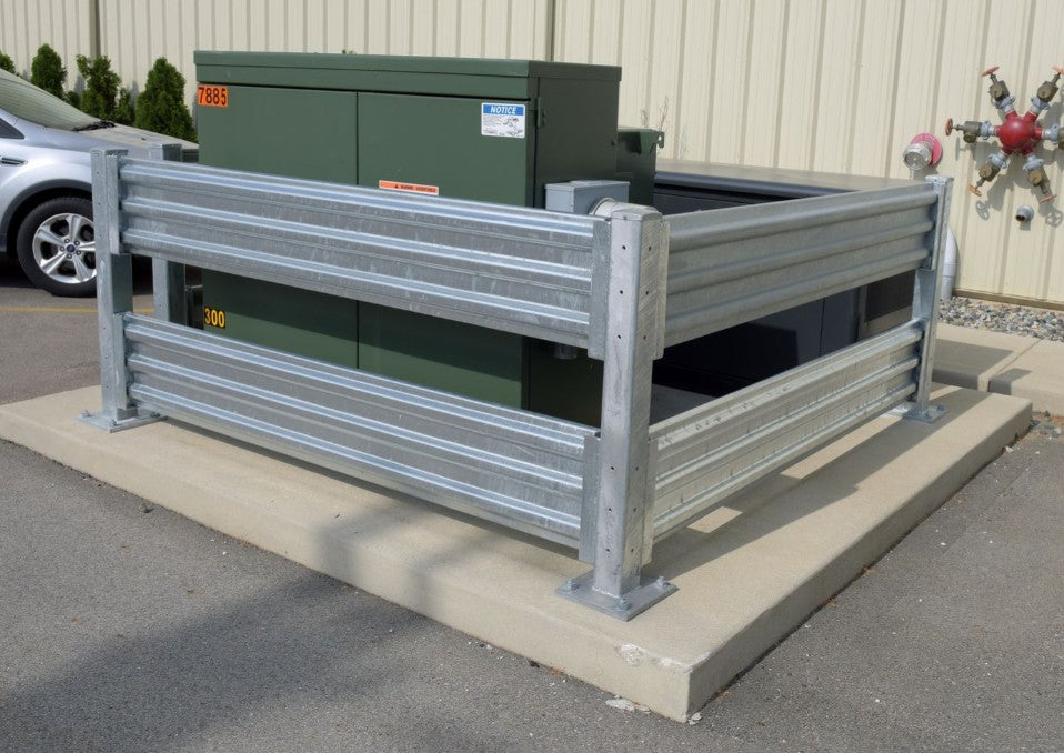 Galvanized Guard Rail from Vestil, drop-in and bolt-on style, used for safety guarding around electrical boxes outdoors.