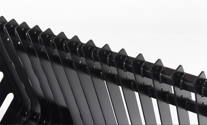 Close-up of Vestil skid steer rock grader attachment showing rugged metal blades for leveling and grading terrain.