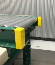 Flexible PVC conveyor frame end guard by TACT Industrial Products, safety edge protector for conveyor guarding systems.