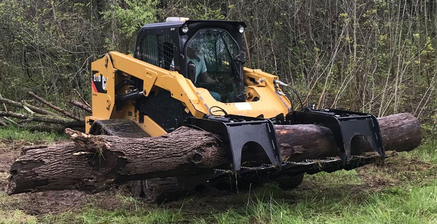 Vestil skid steer with a closed grab bucket attachment for heavy machinery, showcasing durable industrial equipment.